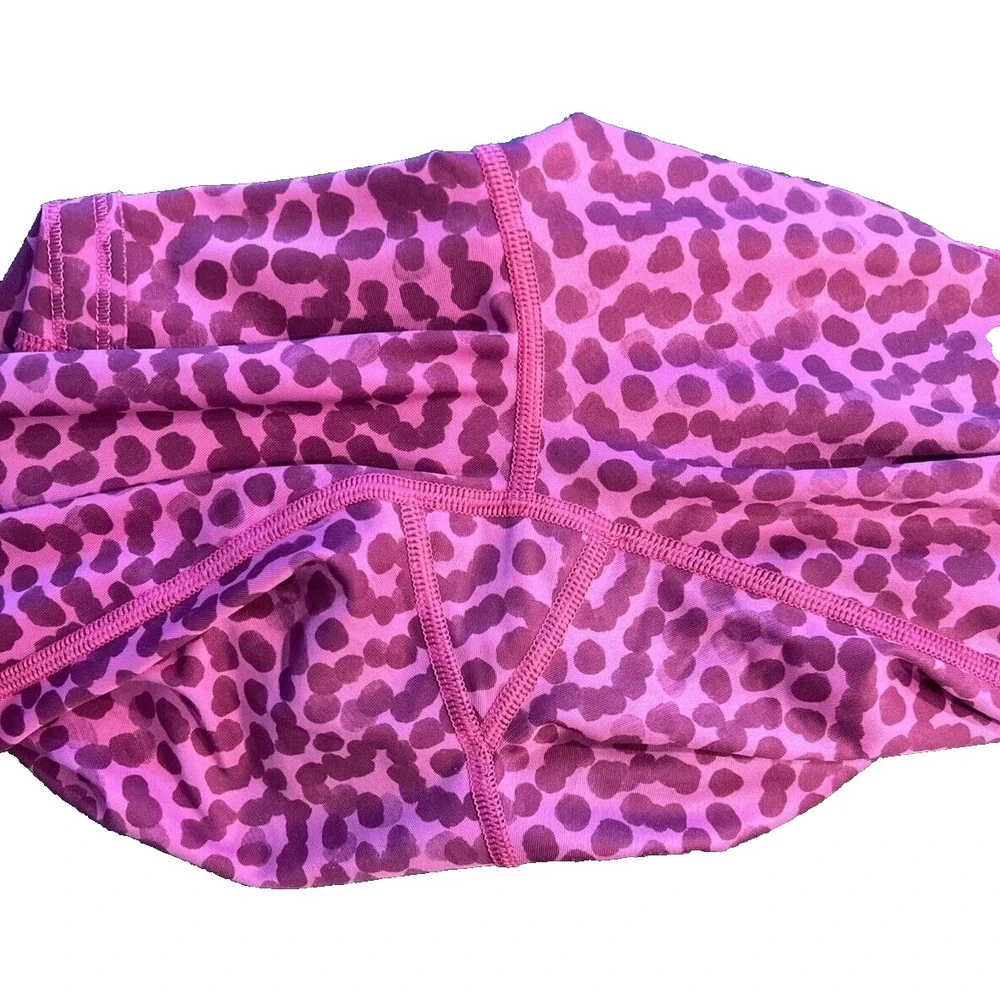 Women's Lululemon Sz 4 Speed Crop Legging animal print Magenta Purple Pocket